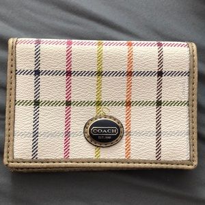 A little coach wallet, I never use it